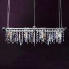 Tribeca Mini-Banqueting Chandelier (8-Bulb) | Chandeliers by Michael McHale Designs. Item composed of metal and glass