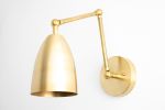 Articulating Sconce - Model No. 0107 | Sconces by Peared Creation. Item composed of brass