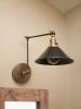 Swing Arm Adjustable Wall Light - Black & Dark Gold | Sconces by Retro Steam Works. Item made of metal works with industrial style