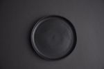Black matte stoneware saucer/small plate/little dish | Tableware by Laima Ceramics. Item composed of stoneware compatible with minimalism and contemporary style