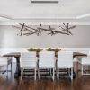 Infinity L | Chandeliers by Next Level Lighting. Item composed of oak wood