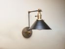 Swing Arm Adjustable Wall Light - Black & Dark Gold | Sconces by Retro Steam Works. Item made of metal works with industrial style