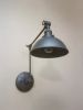 Swinging Adjustable Wall Light - Industrial Bathroom Sconce | Sconces by Retro Steam Works. Item made of metal works with mid century modern & industrial style