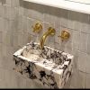 Calacatta Viola Marble Sink: Hand Carved Wall Mount Washbasin | Water Fixtures by AEGEAN MARBLE ARTISAN ATELIER