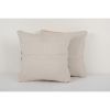 Set of Two Muted Ecru Carpet Rug Pillow | Pillows by Vintage Pillows Store. Item made of fiber
