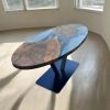 Custom Walnut Epoxy Oval Dining Table | Tables by Ironscustomwood. Item composed of walnut and synthetic