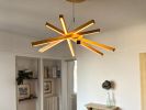 ASTRA chandelier | Chandeliers by Next Level Lighting. Item made of wood