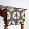 Raffia Shibori Table Runner - Turtle Pattern - Charcoal | Linens & Bedding by Tanana Madagascar. Item composed of fabric and fiber