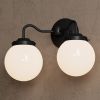 Norwood | Sconces by Illuminate Vintage. Item made of brass & glass