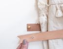 Leather Curtain Tieback [Flag End] | Strap in Storage by Keyaiira | leather + fiber | Artist Studio in Santa Rosa. Item made of leather