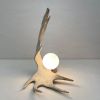 Moose Antler Lamp - Natural | Table Lamp in Lamps by Farmhaus + Co.. Item made of ceramic