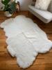 Sacred Spaces Collection: Extra Cuddly White Shorn Sheepskin | Area Rug in Rugs by East Perry. Item composed of wool & fiber