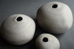 Smooth pebble stone bud vase, minimalist monochrome | Vases & Vessels by Laima Ceramics. Item made of stone compatible with minimalism style