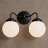 Norwood | Sconces by Illuminate Vintage. Item made of brass & glass