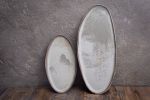 Organic natural shape elongated stoneware plates in grey | Dinnerware by Laima Ceramics. Item made of stoneware compatible with minimalism and contemporary style