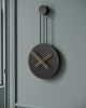 Infinity | Clock in Decorative Objects by MCLOCKS. Item made of steel