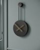 Infinity | Clock in Decorative Objects by MCLOCKS. Item composed of steel