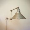 Plug in Kitchen Shelves Sconce - Adjustable Wall Light | Sconces by Retro Steam Works. Item composed of brass in mid century modern or industrial style