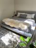Double Sheepskin in Golden White (One-of-a-Kind) | Area Rug in Rugs by East Perry. Item made of fiber