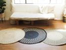 White Triangle Mat | 4' Round | Black Base | Rugs by NEEPA HUT. Item composed of fiber