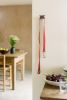 Tirra - Maroon | Wall Hook | Hardware by Upton. Item made of steel