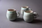 Turquoise  tea/coffee cup mug, white, handmade wheel thrown | Drinkware by Laima Ceramics. Item composed of stoneware compatible with minimalism style