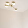 Celeste Incadescence | Chandeliers by DESIGN FOR MACHA. Item composed of brass and glass
