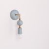 Beaded Sconce: Sphere | Sconces by Pigeon Toe Ceramics. Item composed of brass & ceramic
