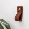 Small Leather Wall Strap [Flag End] | Storage by Keyaiira | leather + fiber | Artist Studio in Santa Rosa. Item composed of leather