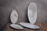Organic natural shape elongated stoneware plates in grey | Dinnerware by Laima Ceramics. Item made of stoneware compatible with minimalism and contemporary style