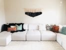 Large Modern Black Triangle Macrame Wall Hanging | Wall Hangings by Love & Fiber. Item composed of cotton and fiber