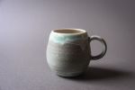 Turquoise  tea/coffee cup mug, white, handmade wheel thrown | Drinkware by Laima Ceramics. Item composed of stoneware compatible with minimalism style