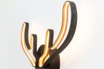 Horns | Sconces by Next Level Lighting. Item composed of wood & metal