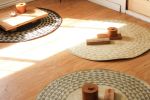 White Triangle Mat | 4' Round | Black Base | Rugs by NEEPA HUT. Item composed of fiber