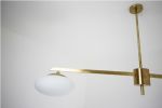 Brass Rod | Pendants by DESIGN FOR MACHA. Item composed of brass