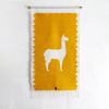 LLAMA Handwoven Tapestry, Ochre | Wall Hangings by ANDEAN. Item composed of wool & bronze compatible with contemporary and traditional style
