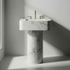 Modern Pedestal Rosso Levanto fluted marble sink | Water Fixtures by AYMARBLEDESIGN LLC