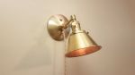 Plug in Adjustable Wall Sconce - Industrial Decor Lighting | Sconces by Retro Steam Works. Item made of brass works with industrial & modern style