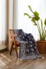 Zuma Throw Blanket | Linens & Bedding by CQC LA. Item composed of cotton