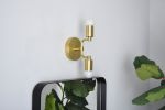 Calvert | Sconces by Illuminate Vintage. Item composed of brass