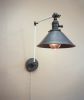Swinging Adjustable Wall Light - Industrial Sconce | Sconces by Retro Steam Works. Item composed of metal compatible with mid century modern and industrial style