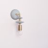 Beaded Sconce: Saucer | Sconces by Pigeon Toe Ceramics. Item composed of steel and ceramic