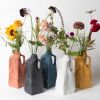 The Garbage Collection: Milk Jug | Vase in Vases & Vessels by Pretti.Cool. Item composed of concrete & glass