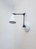 Black & White Adjustable Wall Light - Articulated Industrial | Sconces by Retro Steam Works. Item made of metal compatible with mid century modern and industrial style