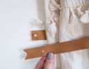 Leather Curtain Tieback [Flag End] | Strap in Storage by Keyaiira | leather + fiber | Artist Studio in Santa Rosa. Item made of leather