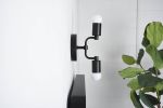 Calvert | Sconces by Illuminate Vintage. Item composed of brass