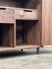 Liquor Cabinet with Glass Hangers, Bottle Storage, Drawers | Storage by Handhold Studio