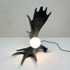 Moose Antler Lamp - Black | Table Lamp in Lamps by Farmhaus + Co.. Item composed of ceramic