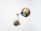 LED Adjustable Wall Globe Sconce - Industrial Ball Light | Sconces by Retro Steam Works. Item composed of brass in industrial style