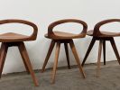 Mid Century Modern Swiveling Dining Chair: Carved Tractor Seat stool, USA made | Chairs by Marco Bogazzi